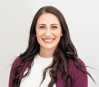 Photo by <a href="https://unsplash.com/@ibidsy?utm_source=unsplash&utm_medium=referral&utm_content=creditCopyText">Clay Elliot</a> on <a href="https://unsplash.com/photos/woman-in-red-cardigan-smiling-mpDV4xaFP8c?utm_source=unsplash&utm_medium=referral&utm_content=creditCopyText">Unsplash</a>